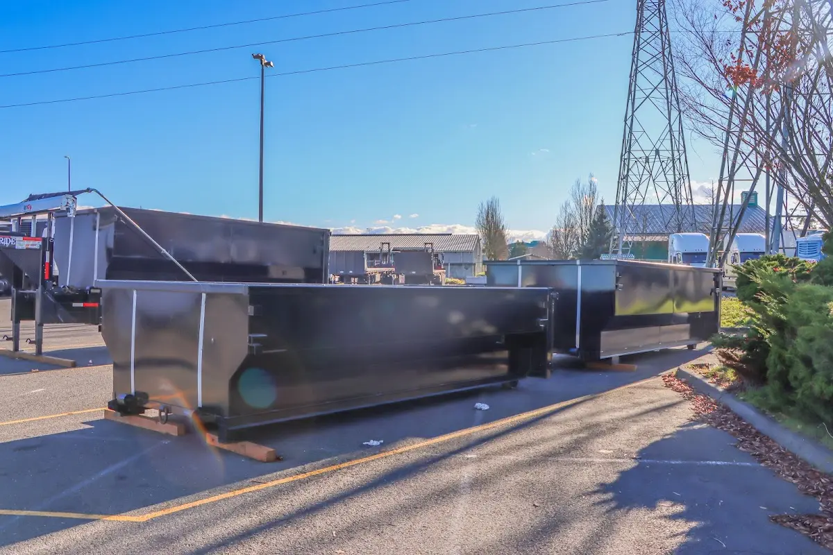 Roll-off dumpster ready for waste disposal at job site for Demolition Dumpster Rental in East Los Angeles